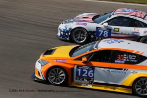 The #78 MRS GT Racing Porsche 911 (991) Cup of Putman, Espenlaup and Maassen passing the #126 CTR Alfatune Seat Leon Cup Racer of Bentley, Gilham and Littman during the 2016 Hankook 12 hrs of Zandvoort.