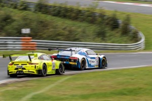 Phoenix Racing Audi R8 LMS GT3 - F. Stippler / 'Dieter Schmidtmann' Manthey Racing Porsche 911 GT3 R - K. Estre / M. Cairoli